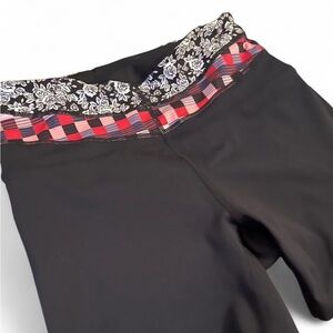 Free People Black Athletic Shorts with Red and White Accents